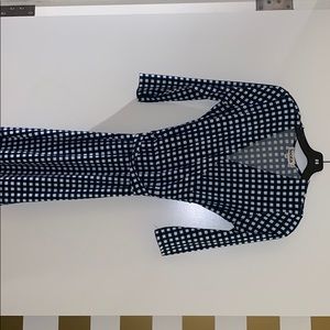 Blue and white checkered faux wrap dress.
